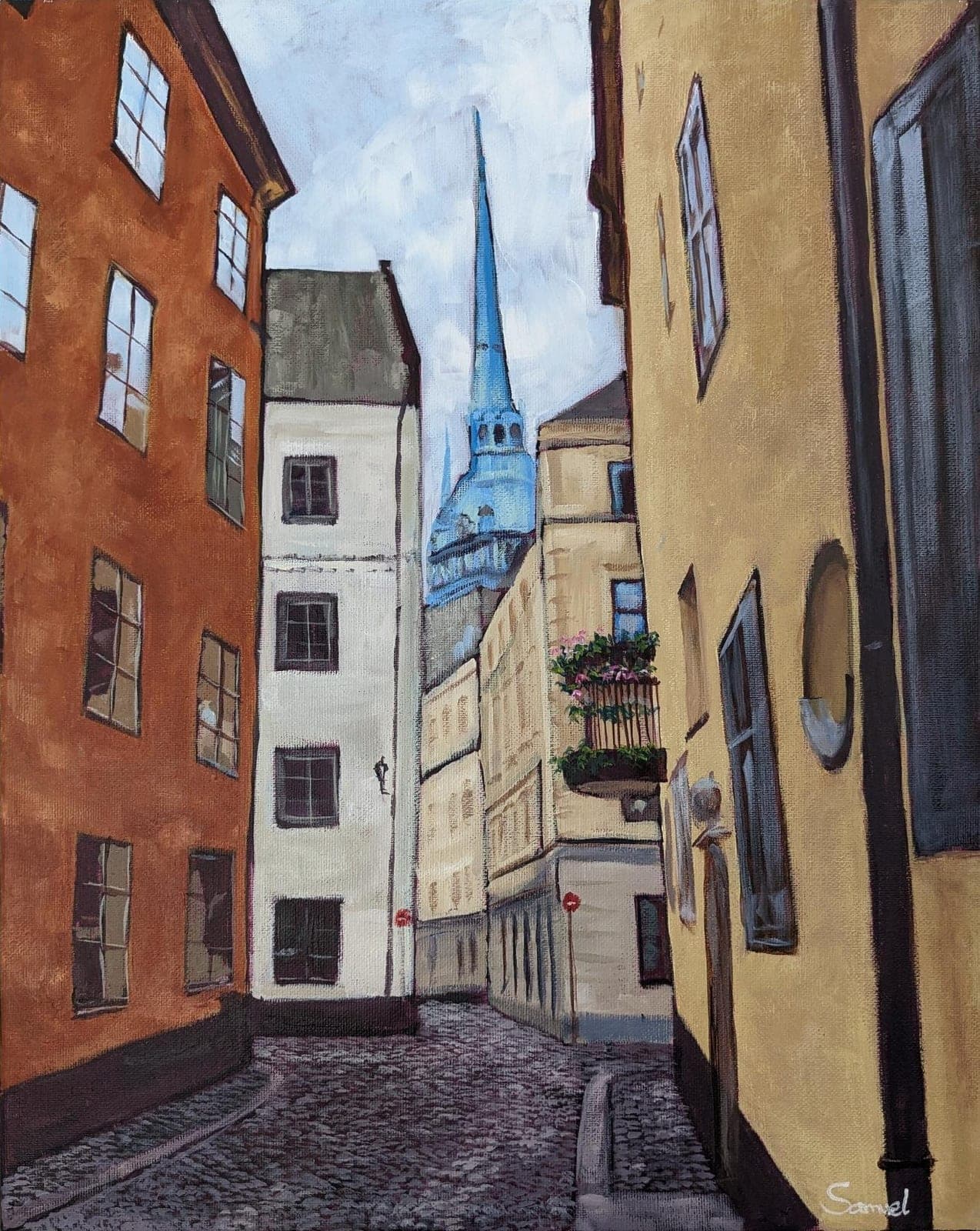 Cobblestone road and church tower – Stockholm