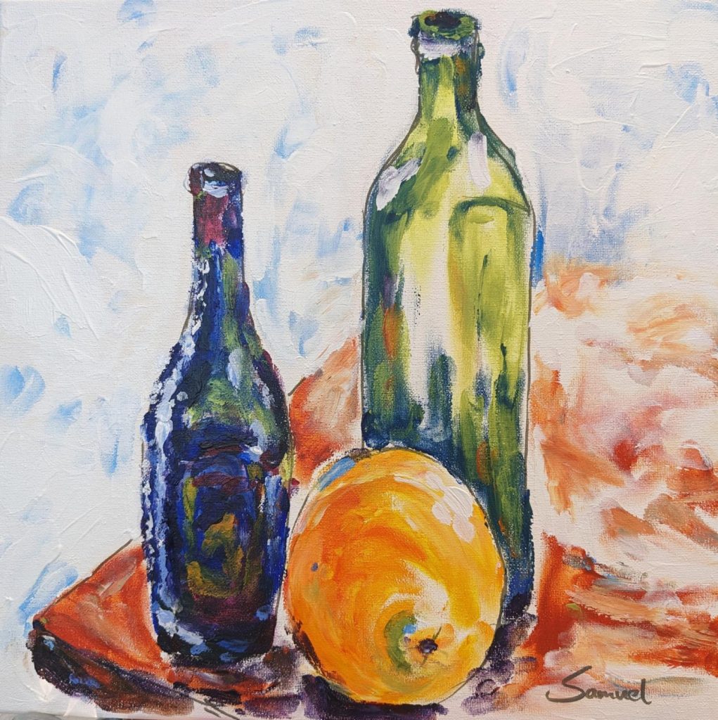 Two bottles and an orange